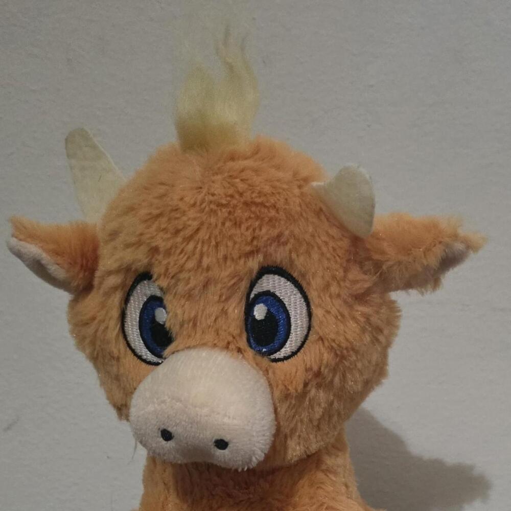Brown cow plush toy with blue eyes #cow #plush